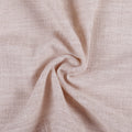 Pink Lemonade Liz linen curtains in a wider lifestyle scene with furnishings and softly flowing folds