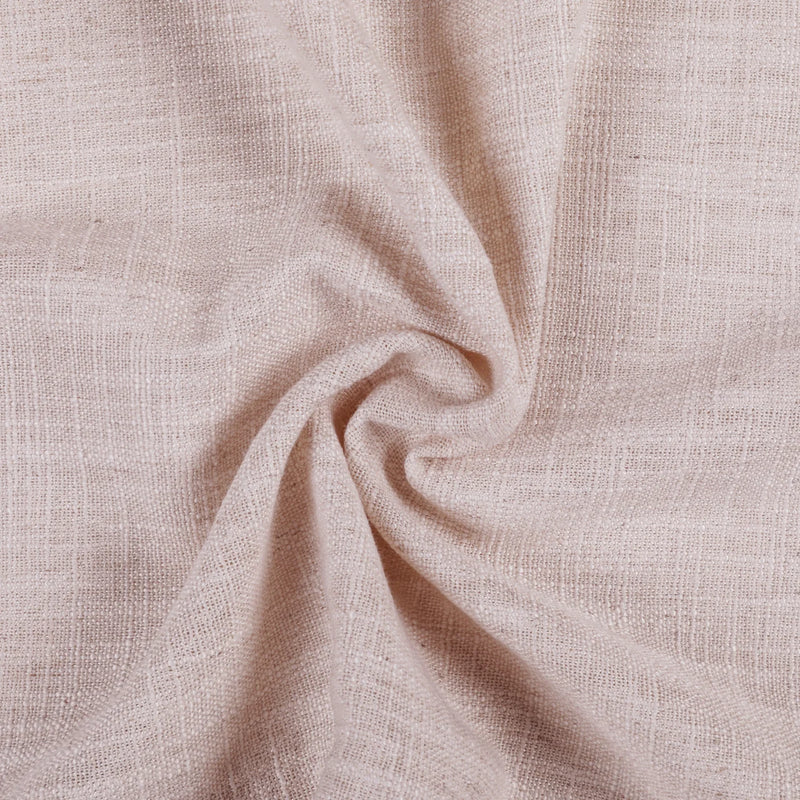 Pink Lemonade Liz linen curtains in a wider lifestyle scene with furnishings and softly flowing folds