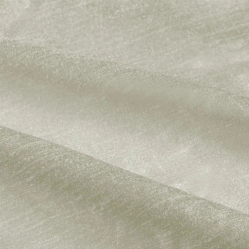 Textile featuring an off-white fabric with a subtle shimmer and a gently folded granular texture