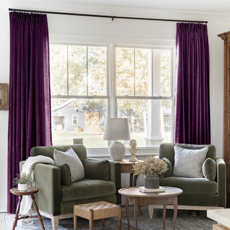 Plum Liz linen curtains framing a bright window in a balanced full-length interior view
