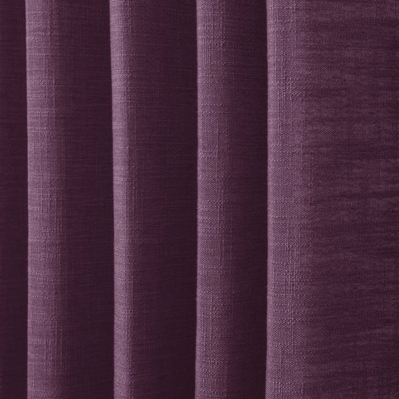 Plum Liz linen curtains in a close room detail highlighting the linen texture and colour