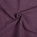 Plum Liz linen curtains drawn partly across the window with filtered light revealing the weave