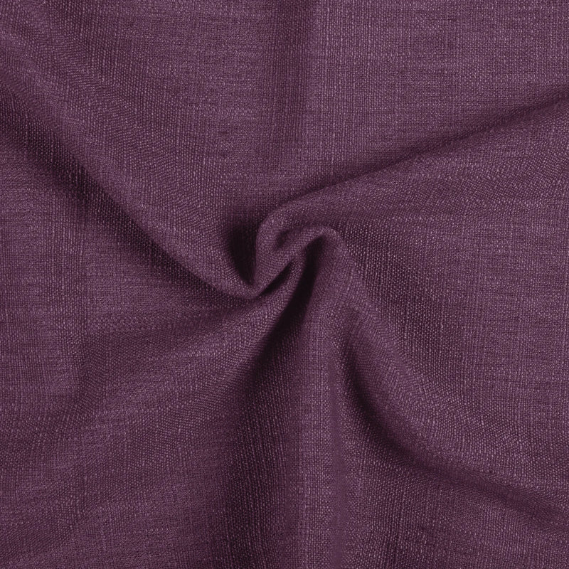 Plum Liz linen curtains drawn partly across the window with filtered light revealing the weave