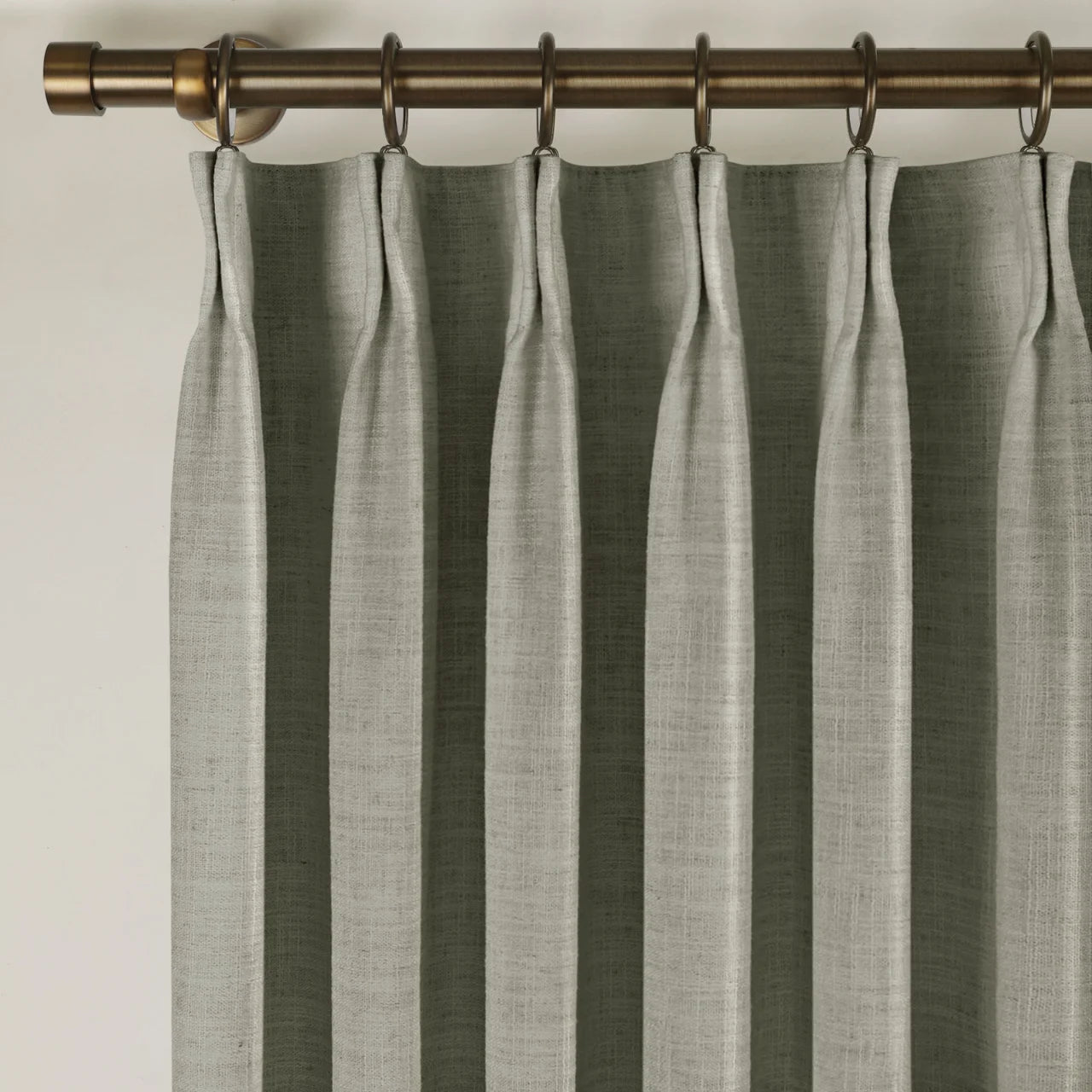 Pure Cashmere Light Grey Liz linen curtains viewed at an angle in a softly styled room with natural daylight