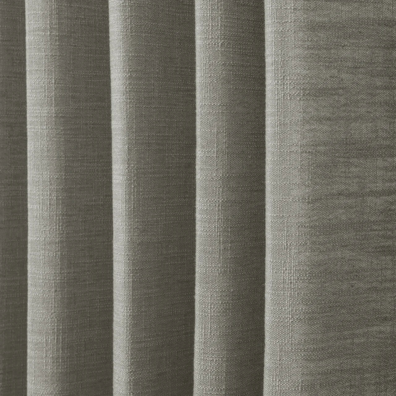 Pure Cashmere Light Grey Liz linen curtains in a close room detail highlighting the linen texture and colour