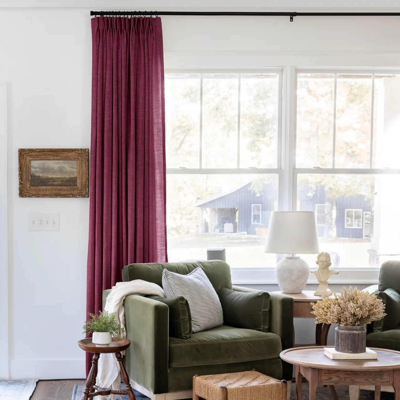 Red Wine Liz linen curtains shown closer beside a sunlit window with smooth vertical folds