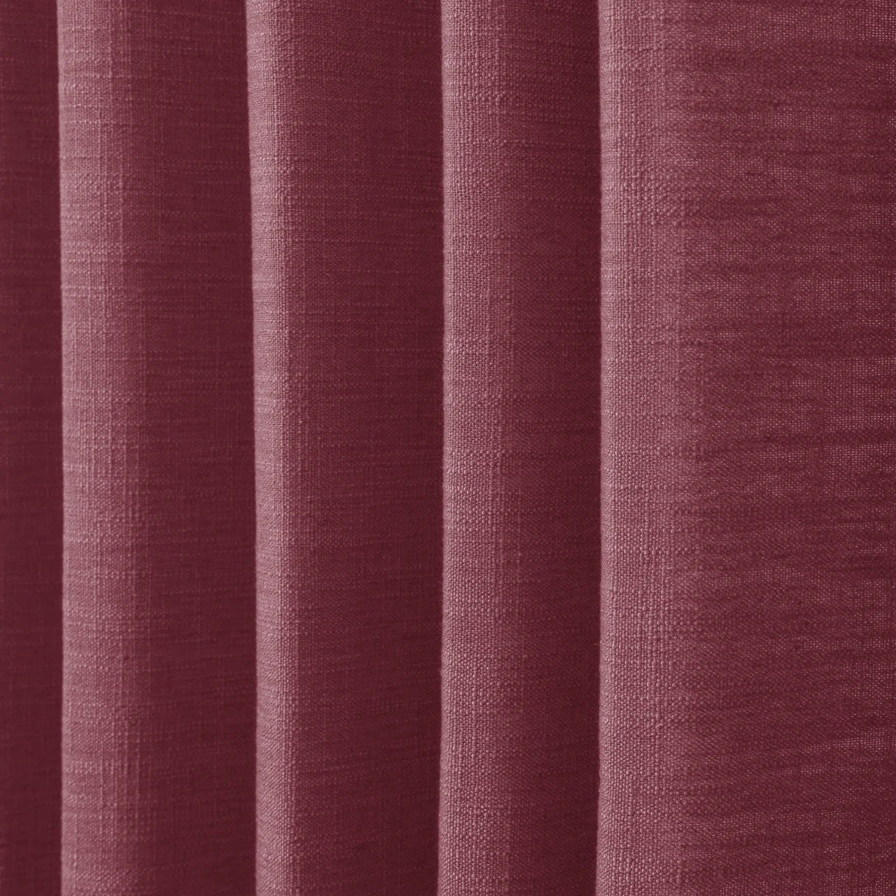 Red Wine Liz linen curtains in a close room detail highlighting the linen texture and colour