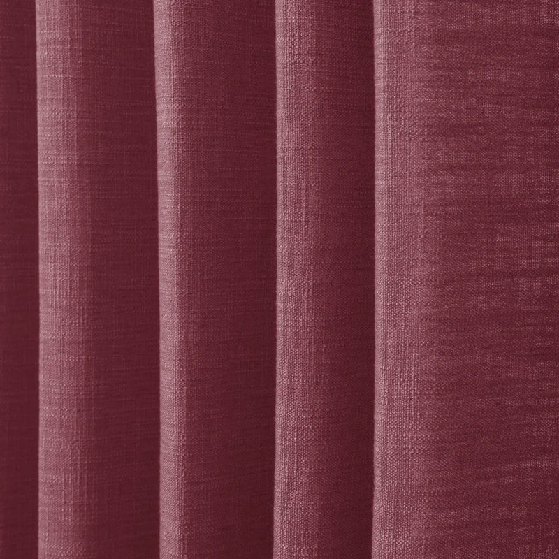 Red Wine Liz linen curtains in a close room detail highlighting the linen texture and colour