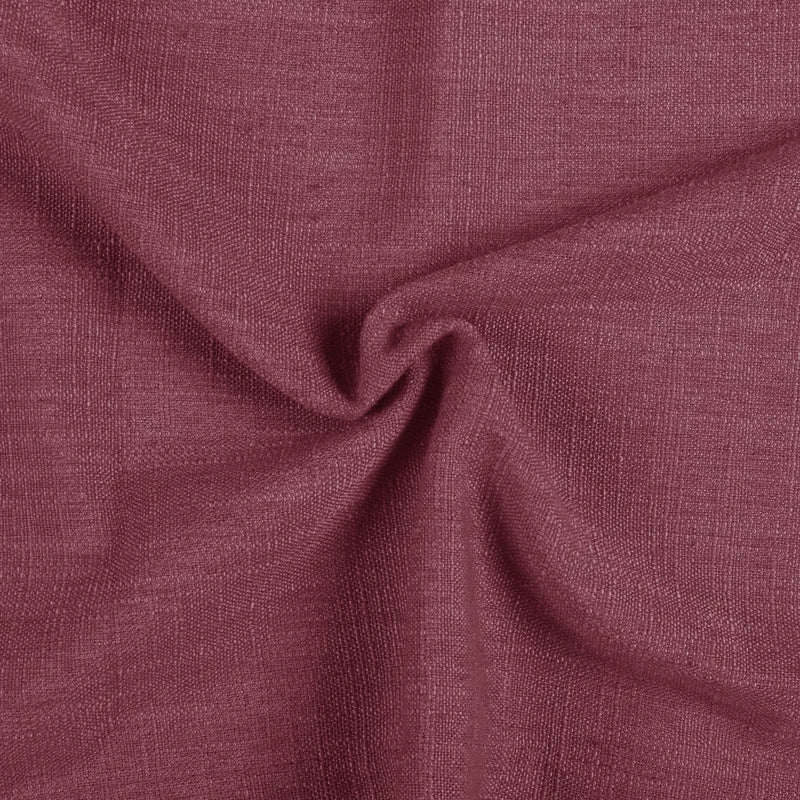 Red Wine Liz linen curtains drawn partly across the window with filtered light revealing the weave