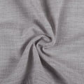 Rock Grey Liz linen curtains drawn partly across the window with filtered light revealing the weave