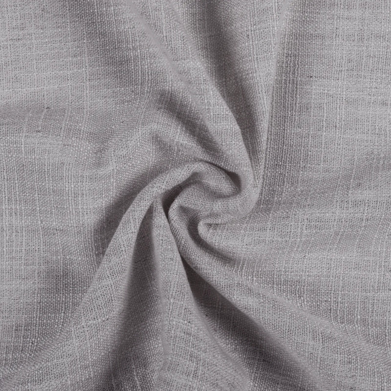 Rock Grey Liz linen curtains drawn partly across the window with filtered light revealing the weave