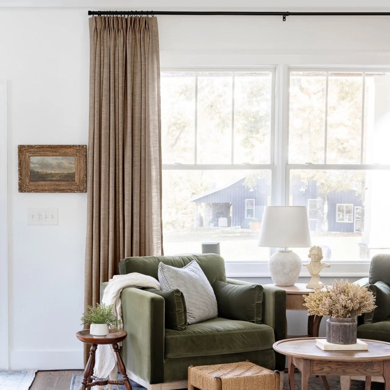 Rust Brown Liz Linen Pleated Curtains beside a green sofa and dried-flower coffee-table arrangement
