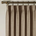Rust Brown Liz Linen Pleated Curtains triple pinch pleat heading on a bronze curtain rod