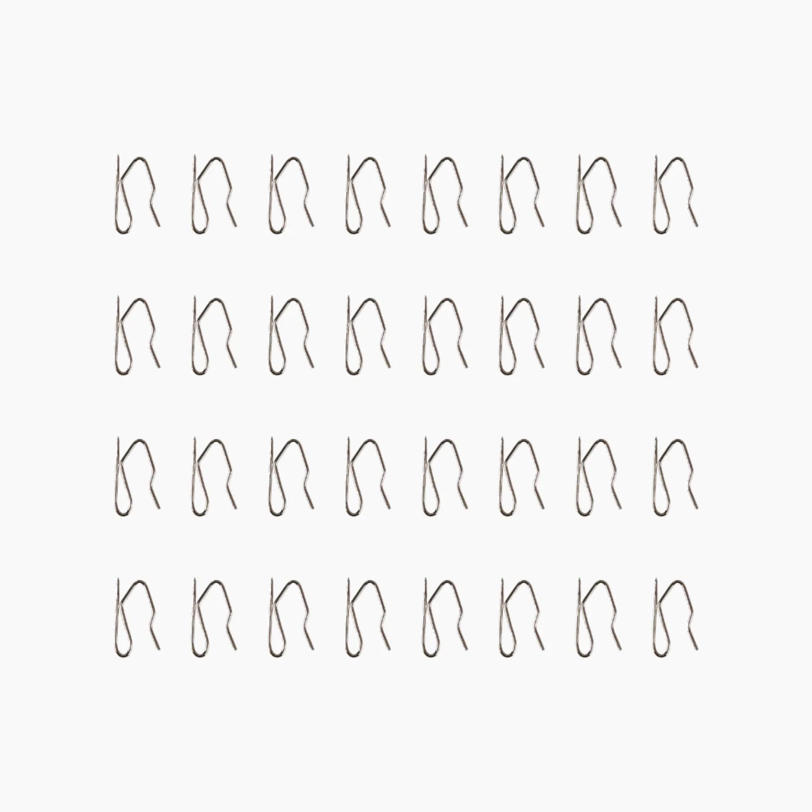 Thirty-two silver metal R-clips arranged neatly in four rows on a plain white background