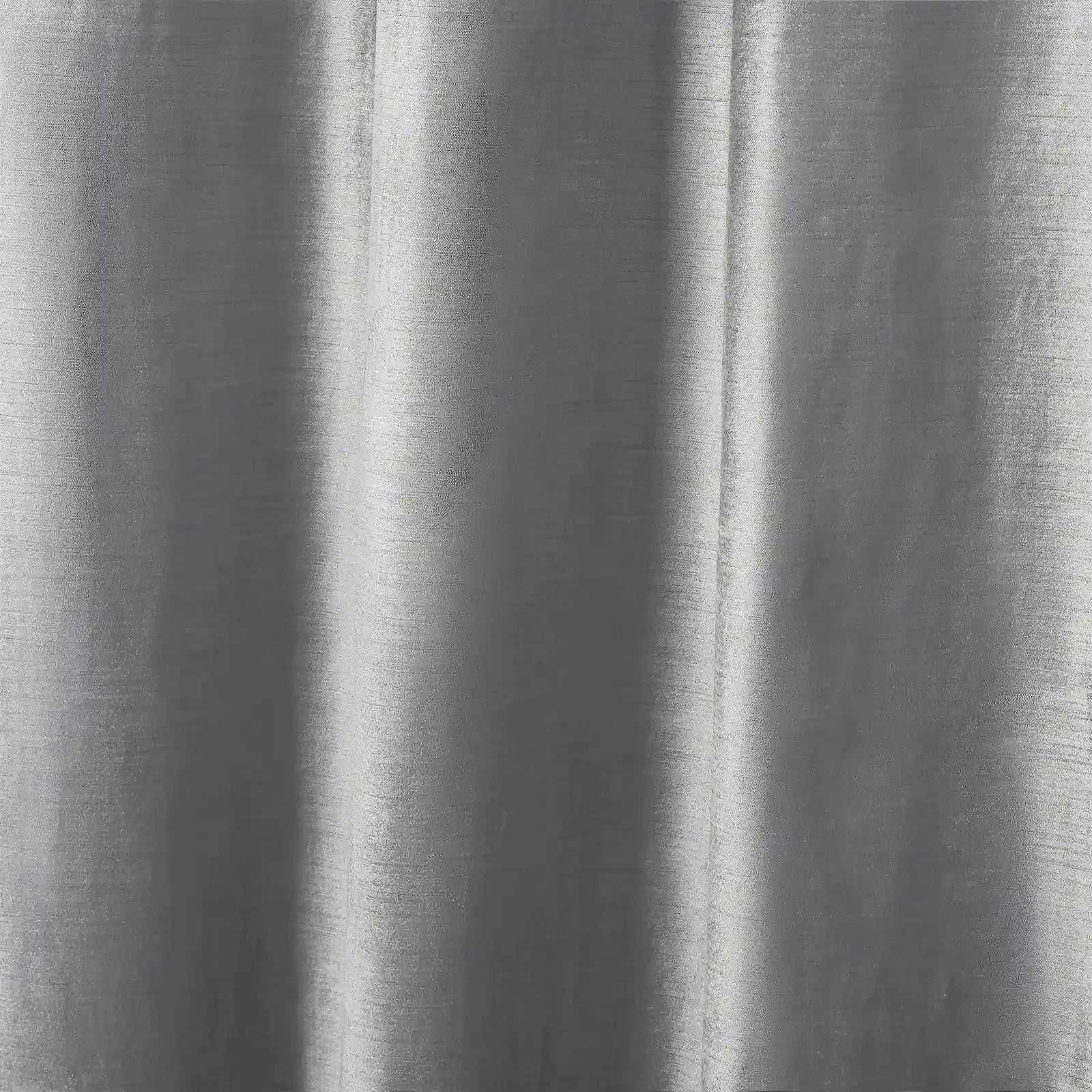 A draped grey textured fabric exhibiting subtle vertical striations and variations of light silver and charcoal grey