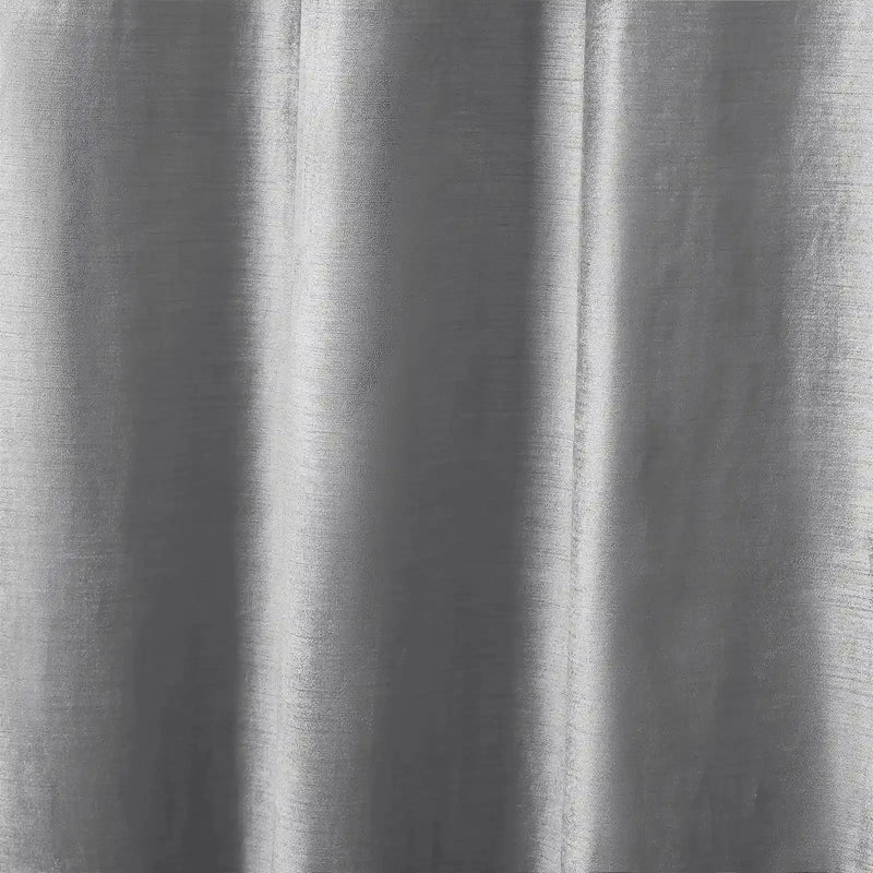 A draped grey textured fabric exhibiting subtle vertical striations and variations of light silver and charcoal grey
