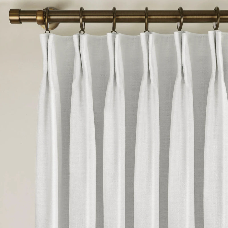 Snow White Liz Linen Pleated Curtains triple pinch pleat heading on a bronze curtain rod