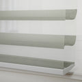 Textured light grey and white zebra Blind with alternating opaque and sheer horizontal stripes installed in a window