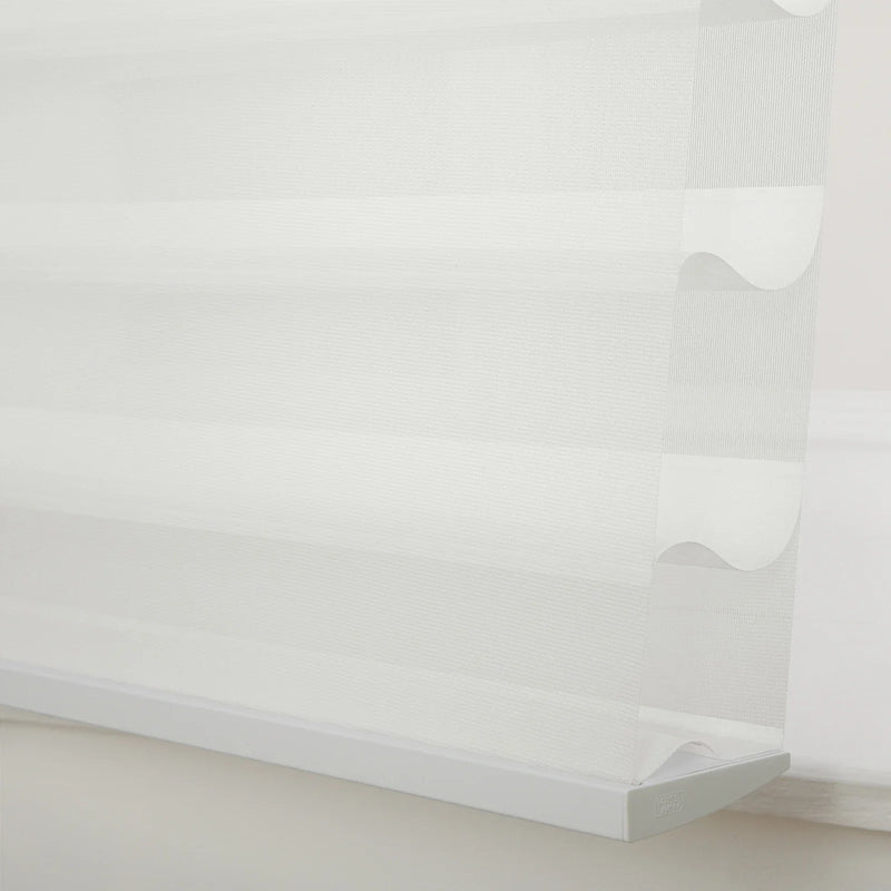 White sheer zebra Blinds with alternating translucent and opaque horizontal fabric strips featuring a clean white bottom rail and a distinct Massi Work logo