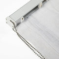 Close-up detail of a roller blind system showing a silver metal track, white sheer fabric with a subtle texture, and a shiny double silver ball chain pull cord attached to a white plastic mechanism