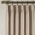 Tapioca Liz Linen Pleated Curtains triple pinch pleat heading on a bronze curtain rod
