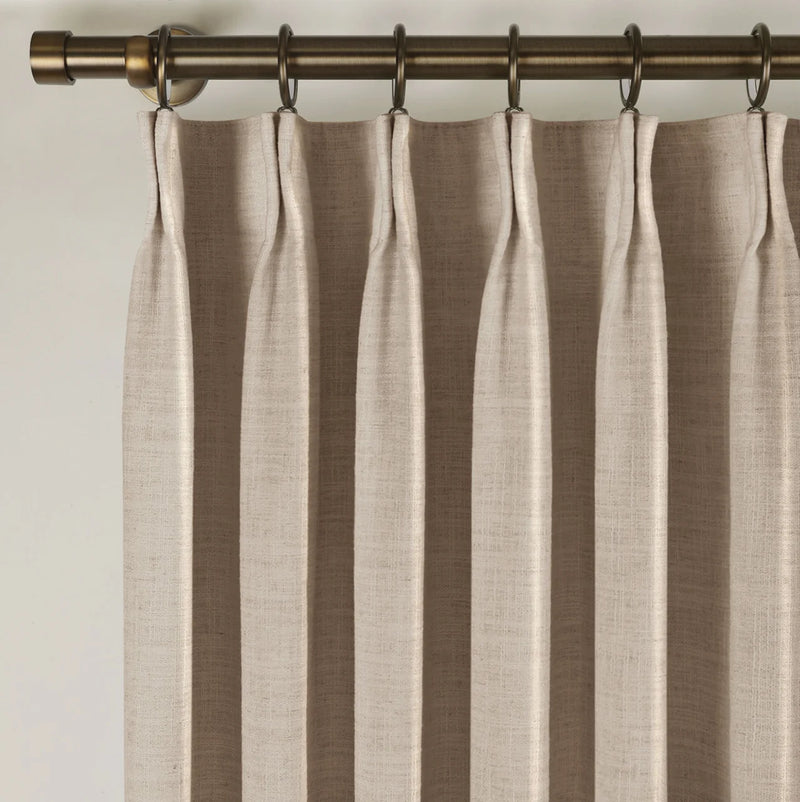 Tapioca Liz Linen Pleated Curtains triple pinch pleat heading on a bronze curtain rod