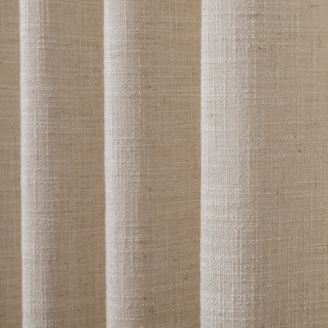 Tapioca Liz Linen Pleated Curtains semi-sheer linen weave shown in vertical folds