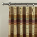 A close-up of a pinch pleat curtain in a rustic plaid pattern featuring beige, brown, plum, and subtle teal lines, suspended from a brushed satin nickel curtain rod with rings and a spherical finial